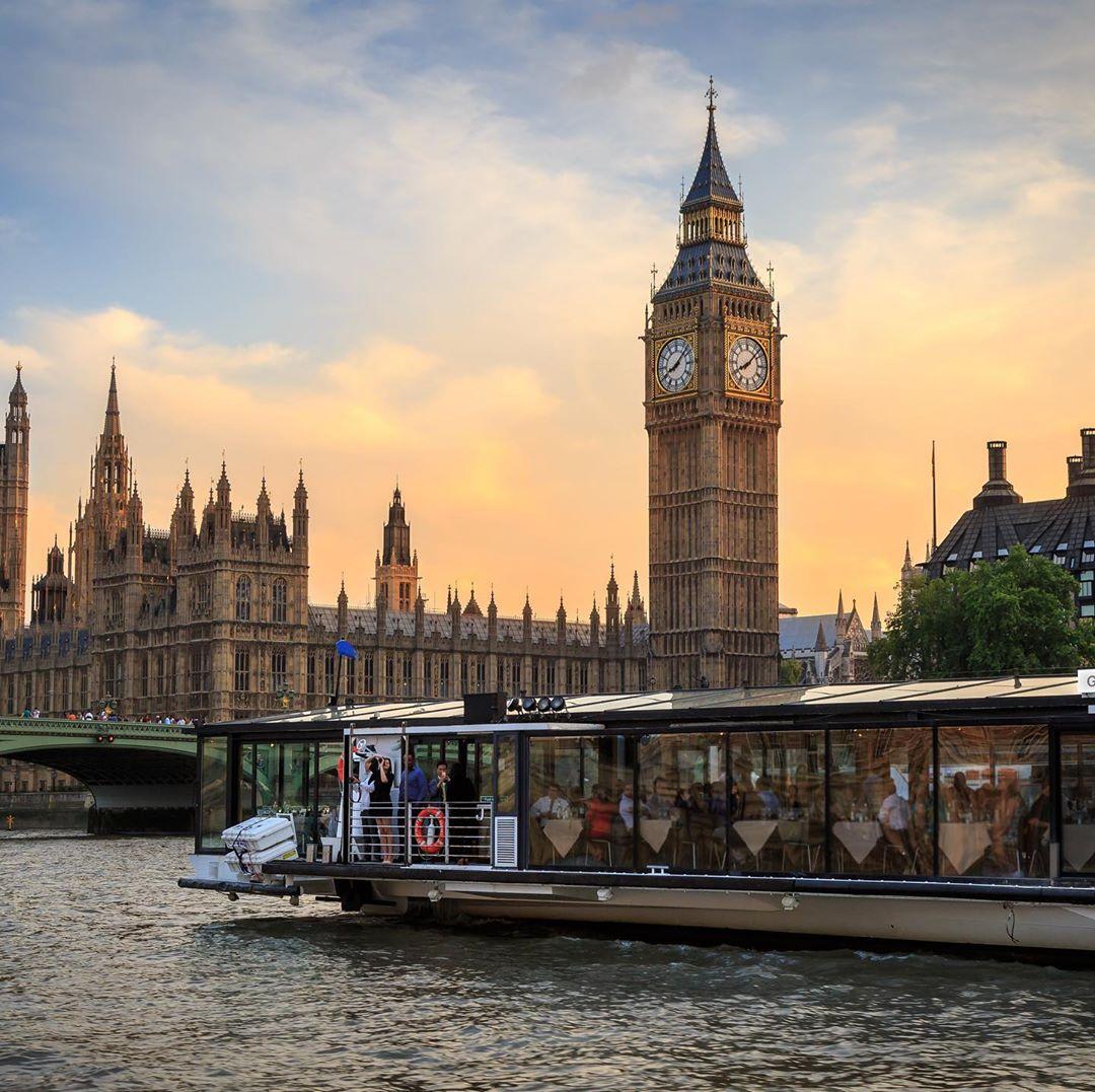The Bateaux dinner cruise sailing in front of the Houses of Parliament in Westminster