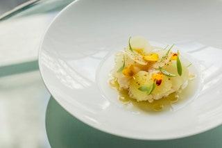 The chef who was once Gordon Ramsays righthand man now dishes up Britishfocused food at Parkers Tavern inside smart...